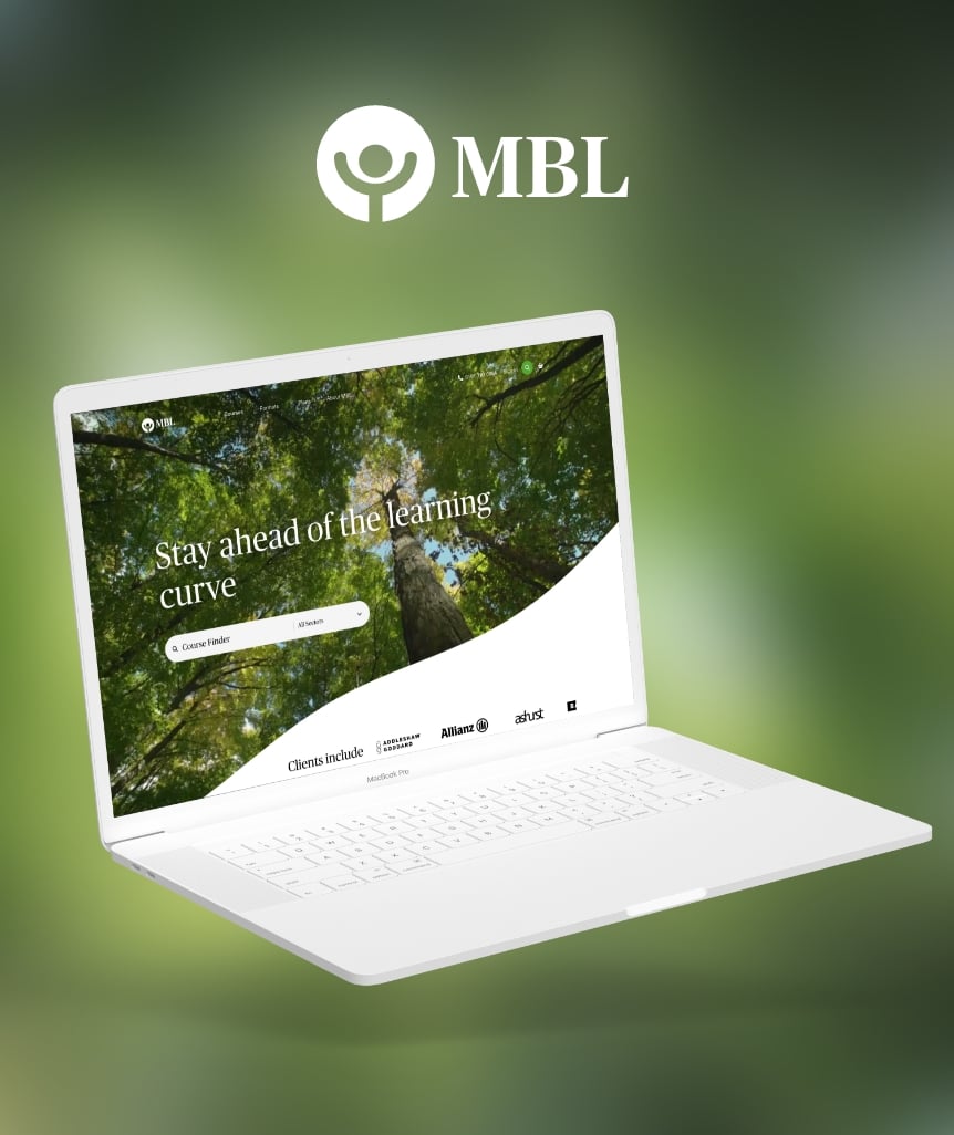 Laptop displaying MBL Seminars' bespoke web design within the B2B sector