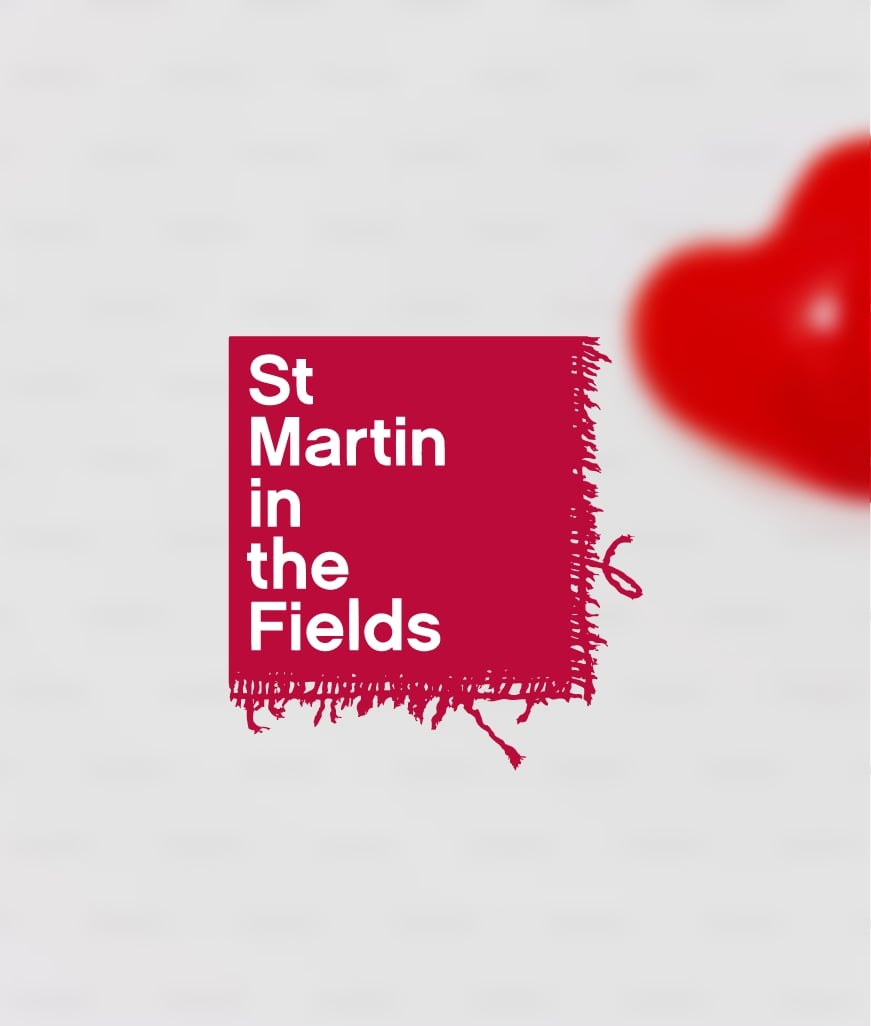 St Martin-in-the-Fields Charity logo displayed on grey and red background