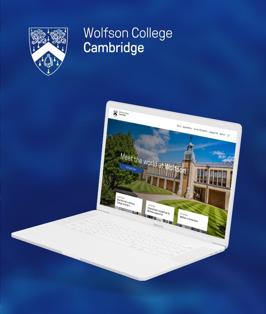 Laptop displaying Wolfson College's bespoke web design within the education sector