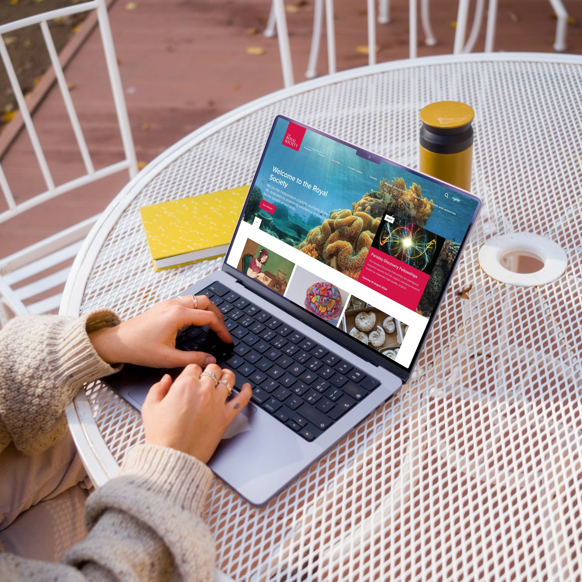 Laptop displaying homepage of Royal Society’s Science & Research web design, designed by Contra Agency