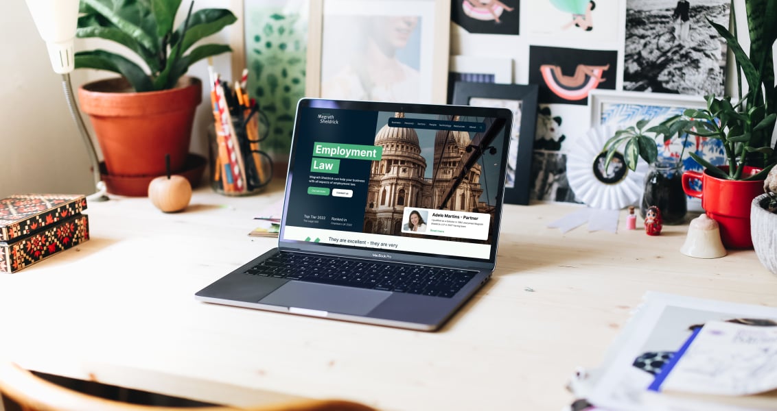 Magrath Sheldrick website laptop on desk