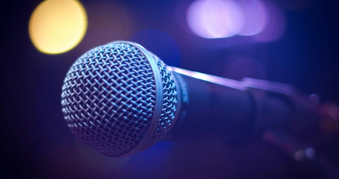 microphone on purple background