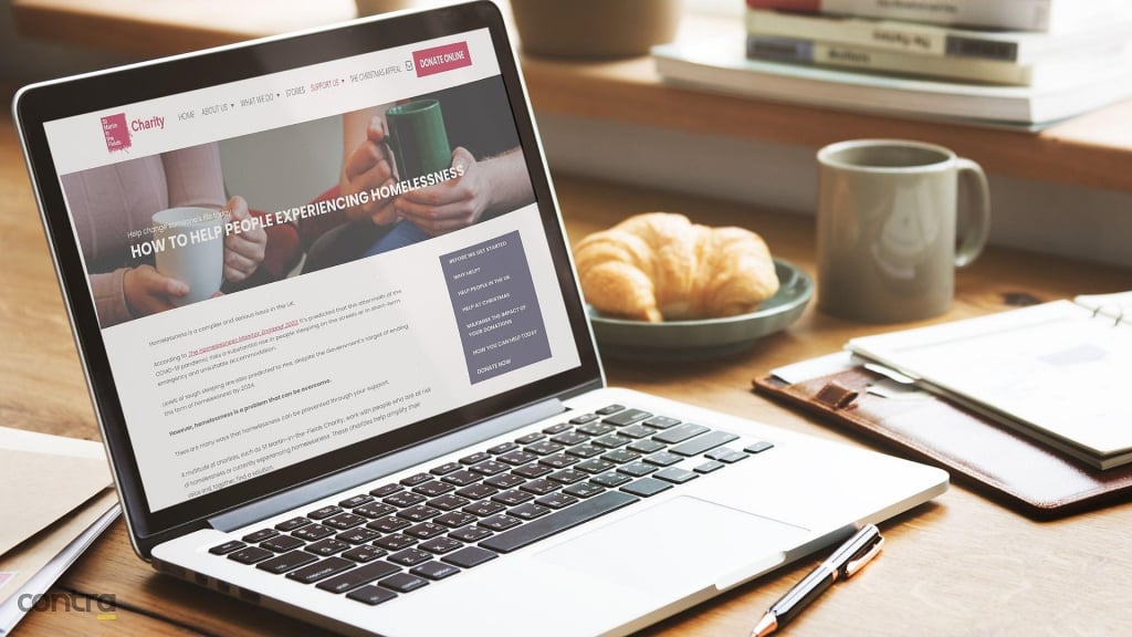 Laptop displaying St Martin-in-the-Fields Charity pillar page for SEO web design principleple