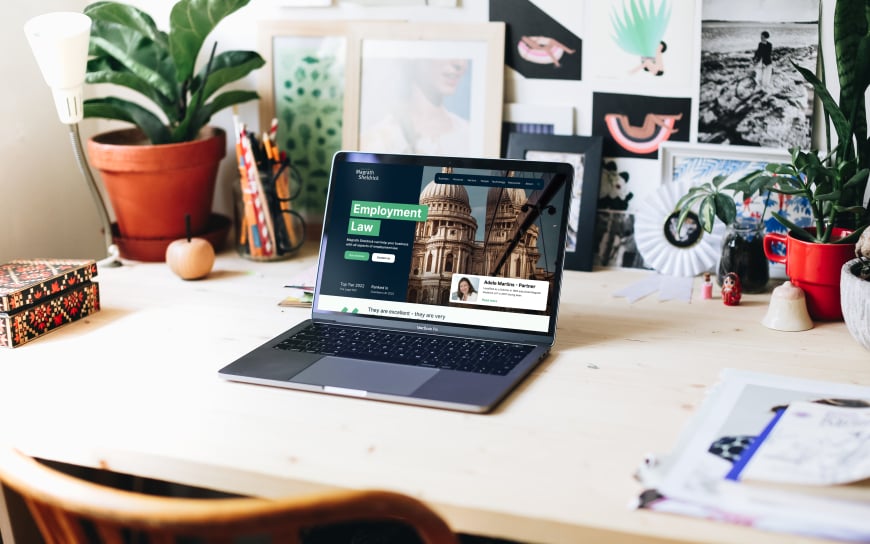Magrath Sheldrick website laptop on desk