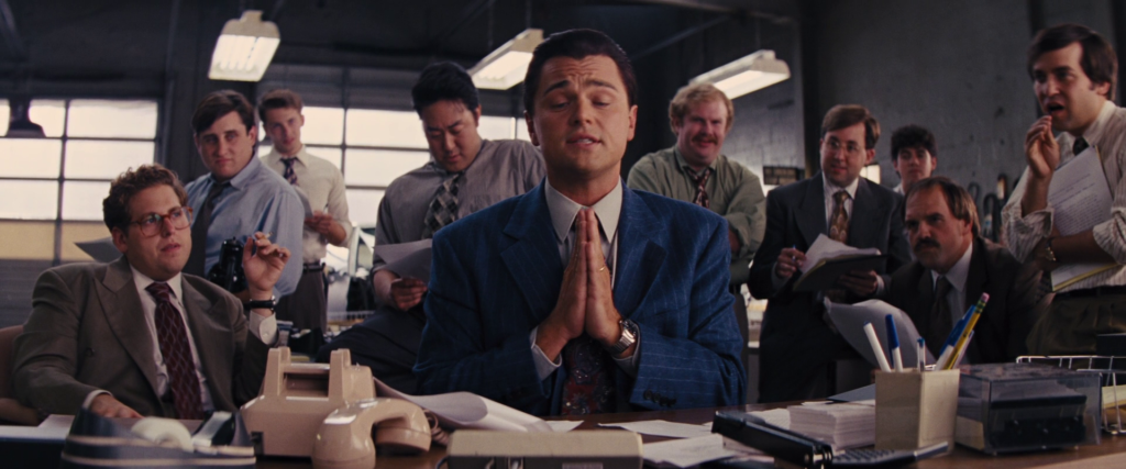 Wolf of Wall street image to describe the definition of outbound marketing. 
